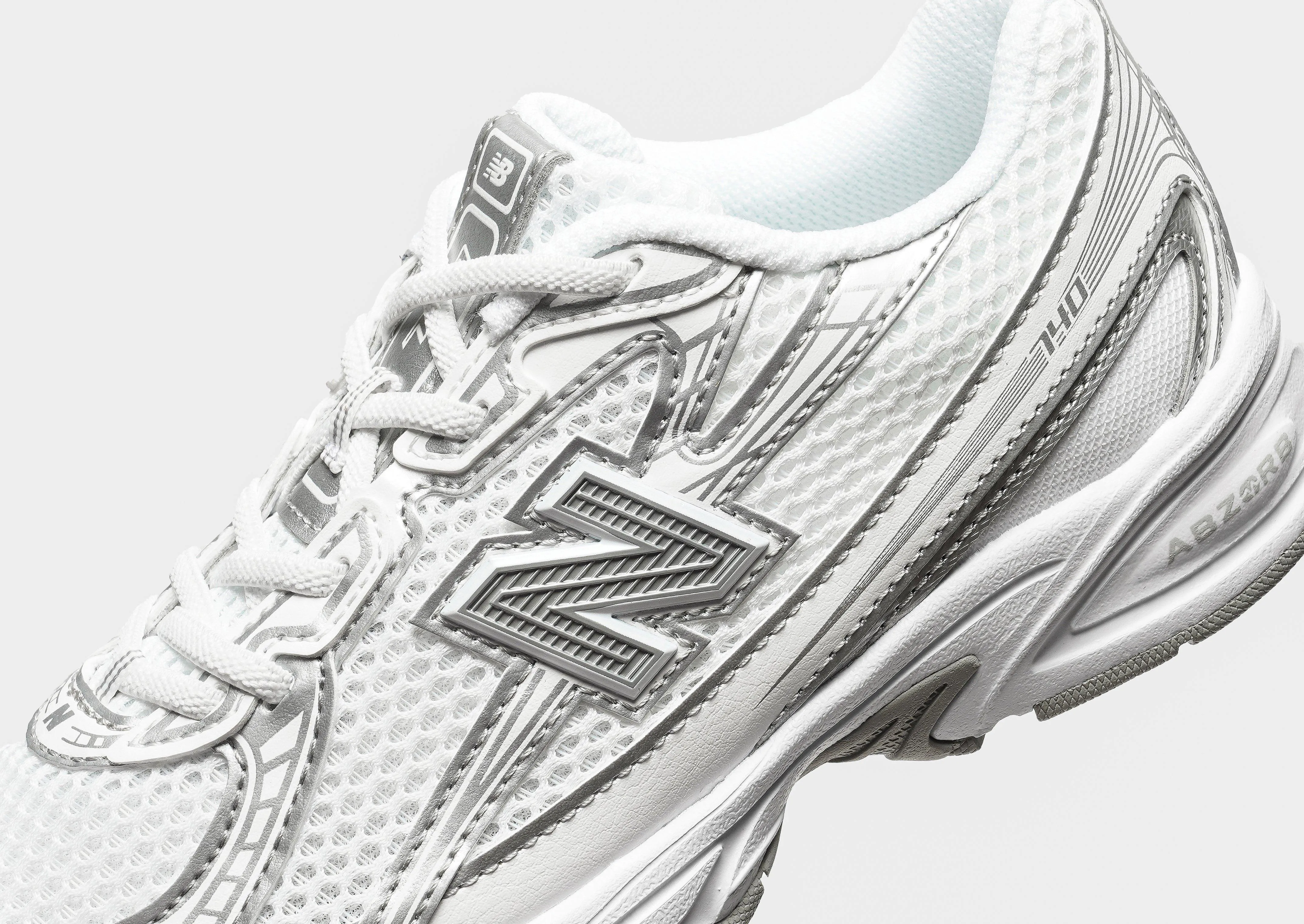 Metallic accents running in a suburban area shoes 740 Children's