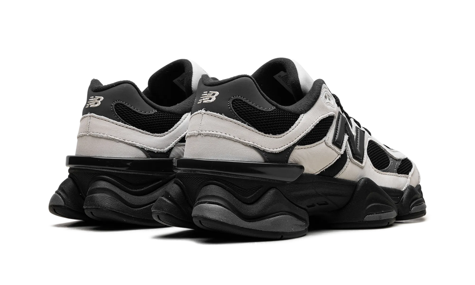 9060 "Off White Black" running in an iconic bridge area shoes
