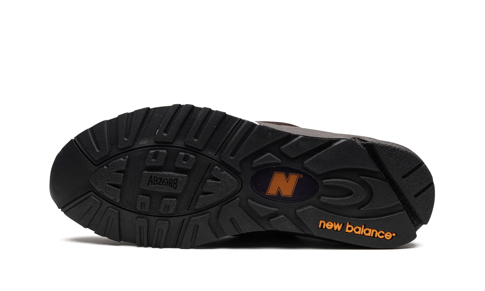 990 v2 "Brown/Orange/Purple" running on trail