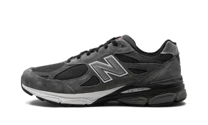 990v3 "United Arrows & Sons - Grey" competition equipment running in a sinter terrace area shoes