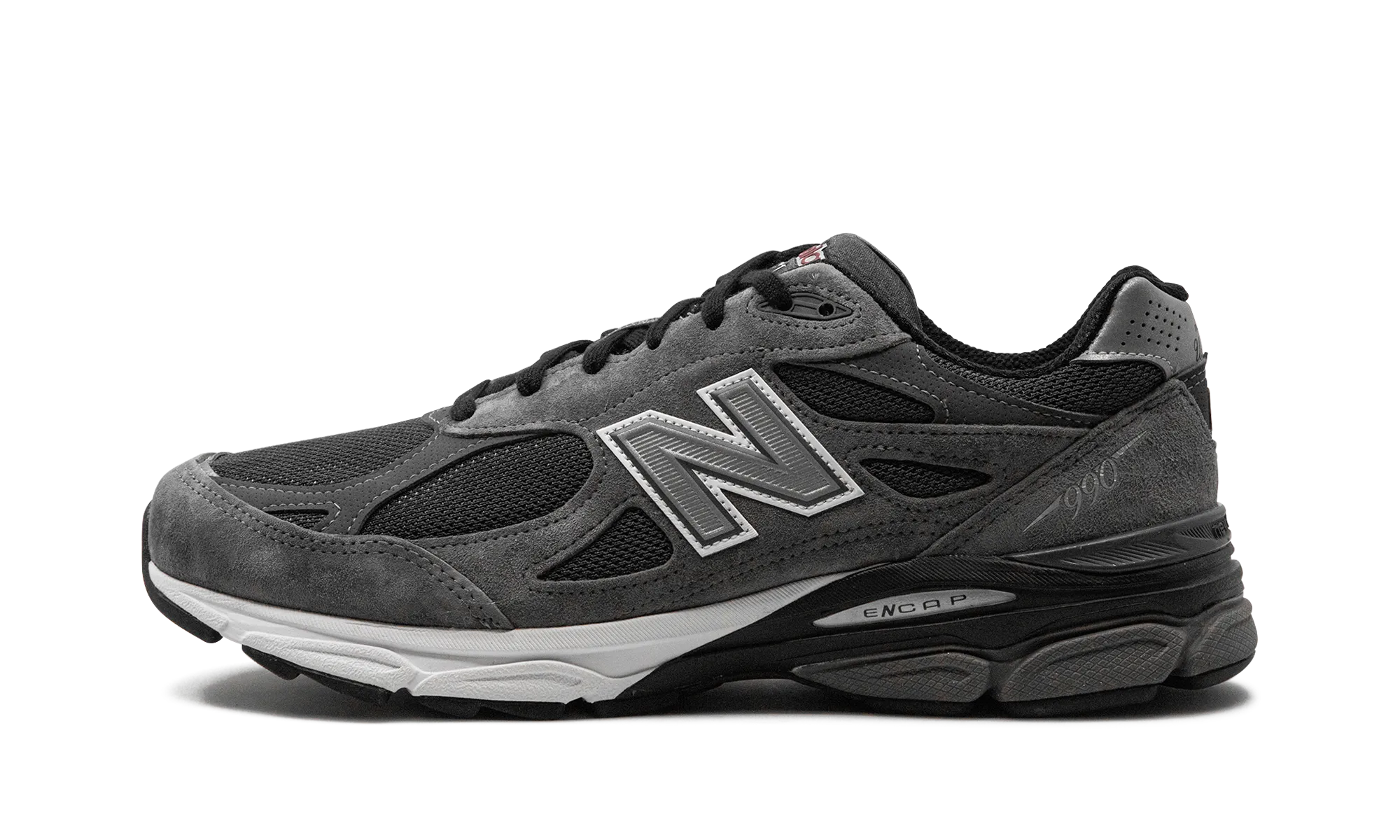 990v3 "United Arrows & Sons - Grey" competition equipment running in a sinter terrace area shoes