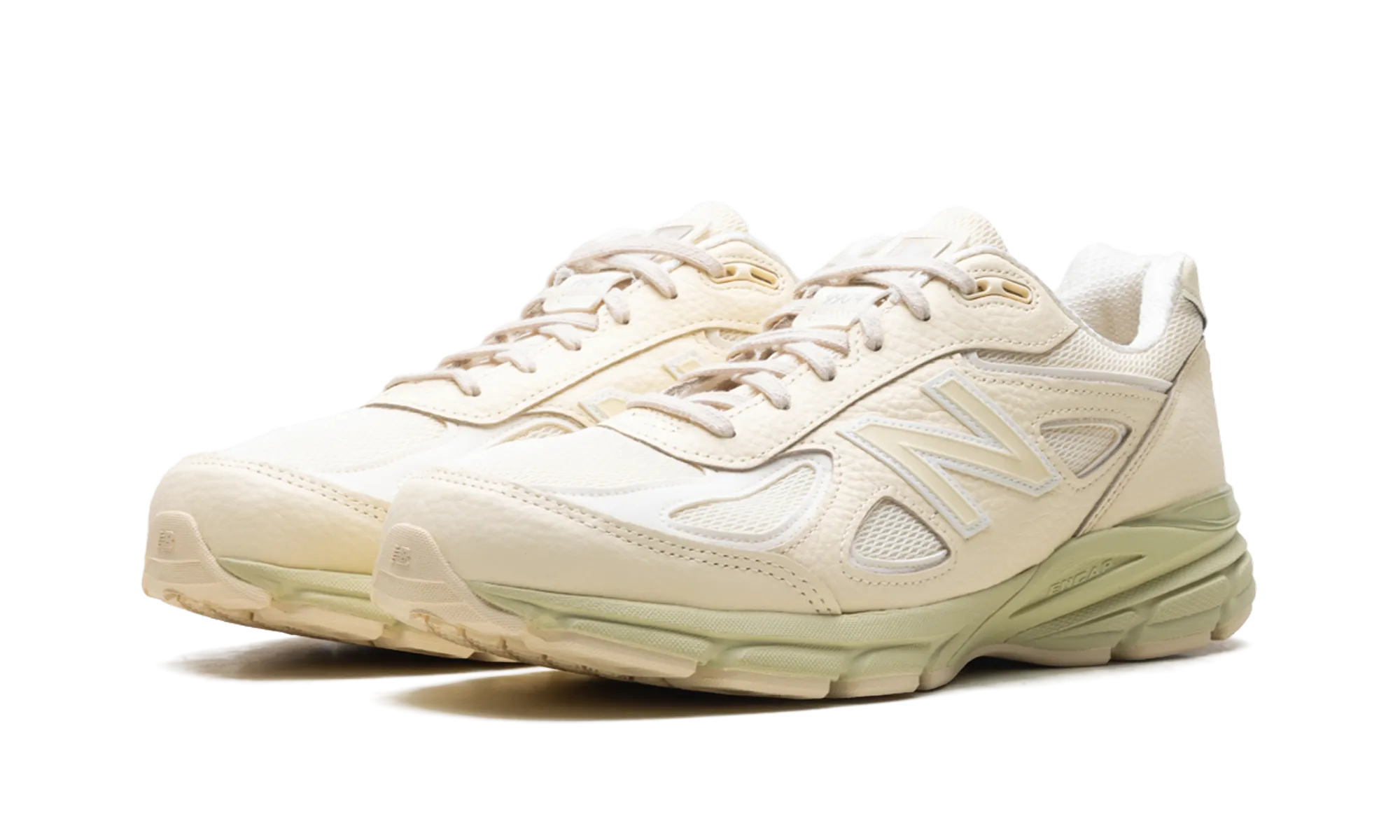 running in a monorail station area shoes anti - slip 990v4 "Made in USA - Macadamia Nut"