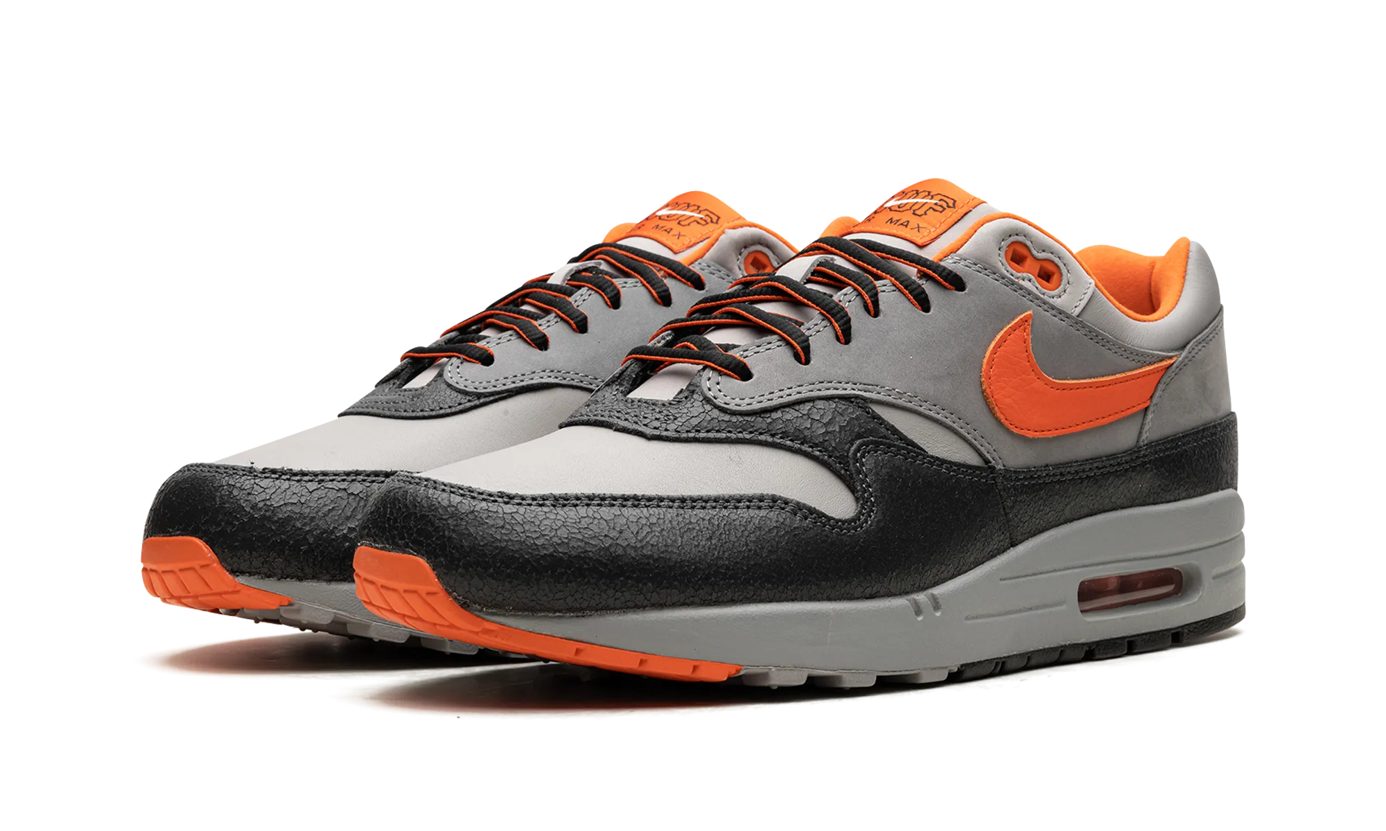 running in a cable car area shoes Air Max 1 SP "HUF BRILLIANT ORANGE"