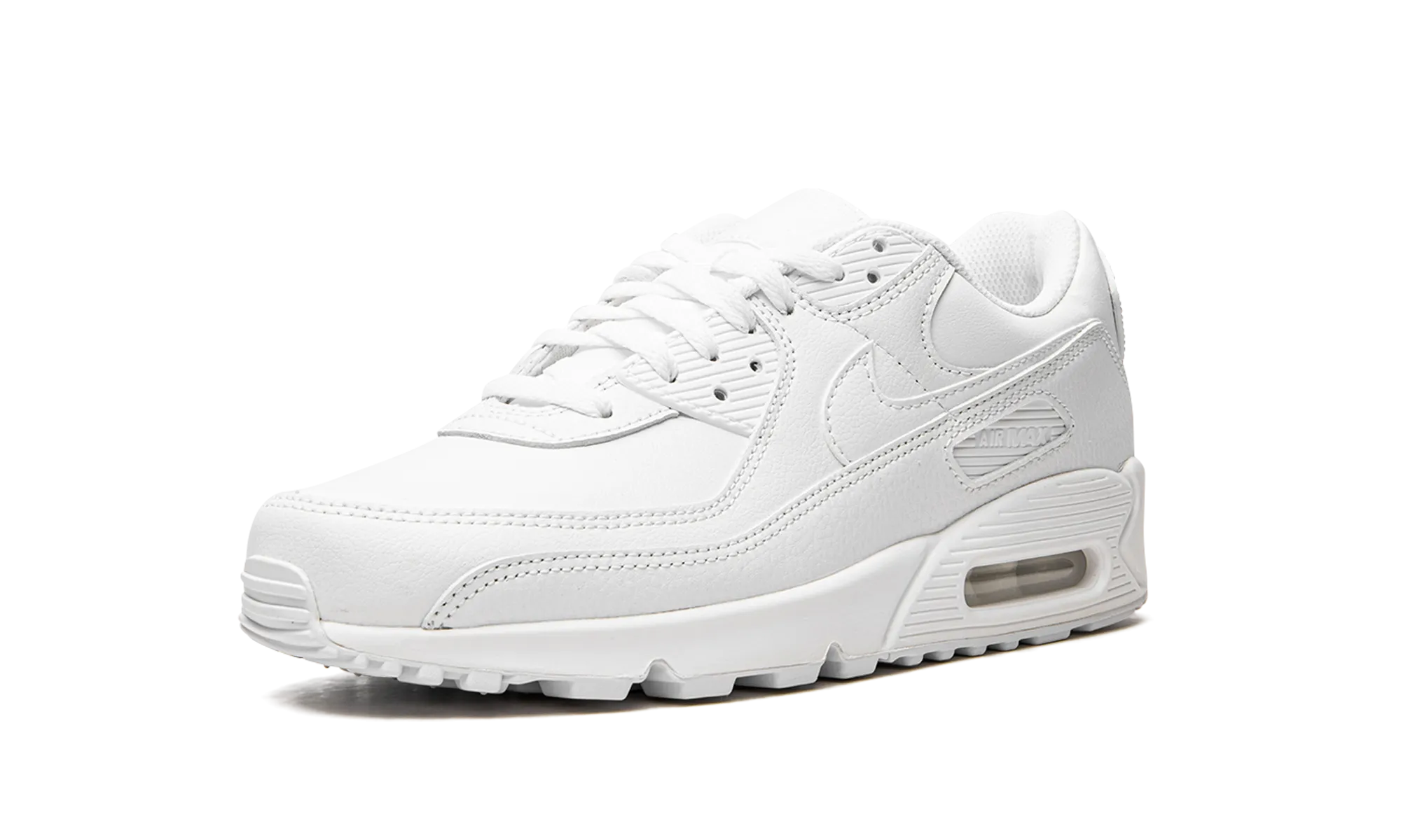 Air Max 90 "Triple White" running in a tundra area