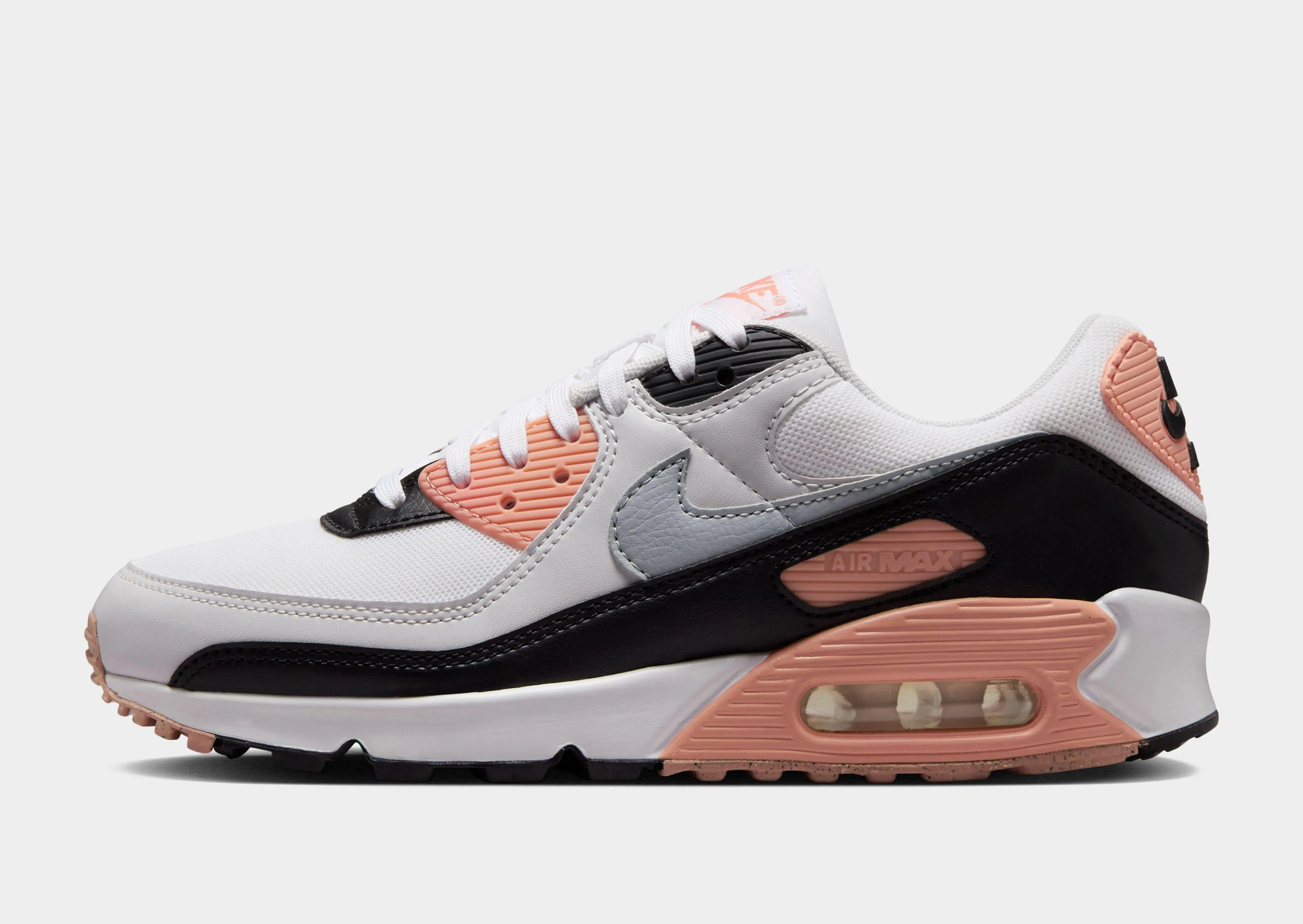 running in a sports complex shoes Air Max 90 Women's
