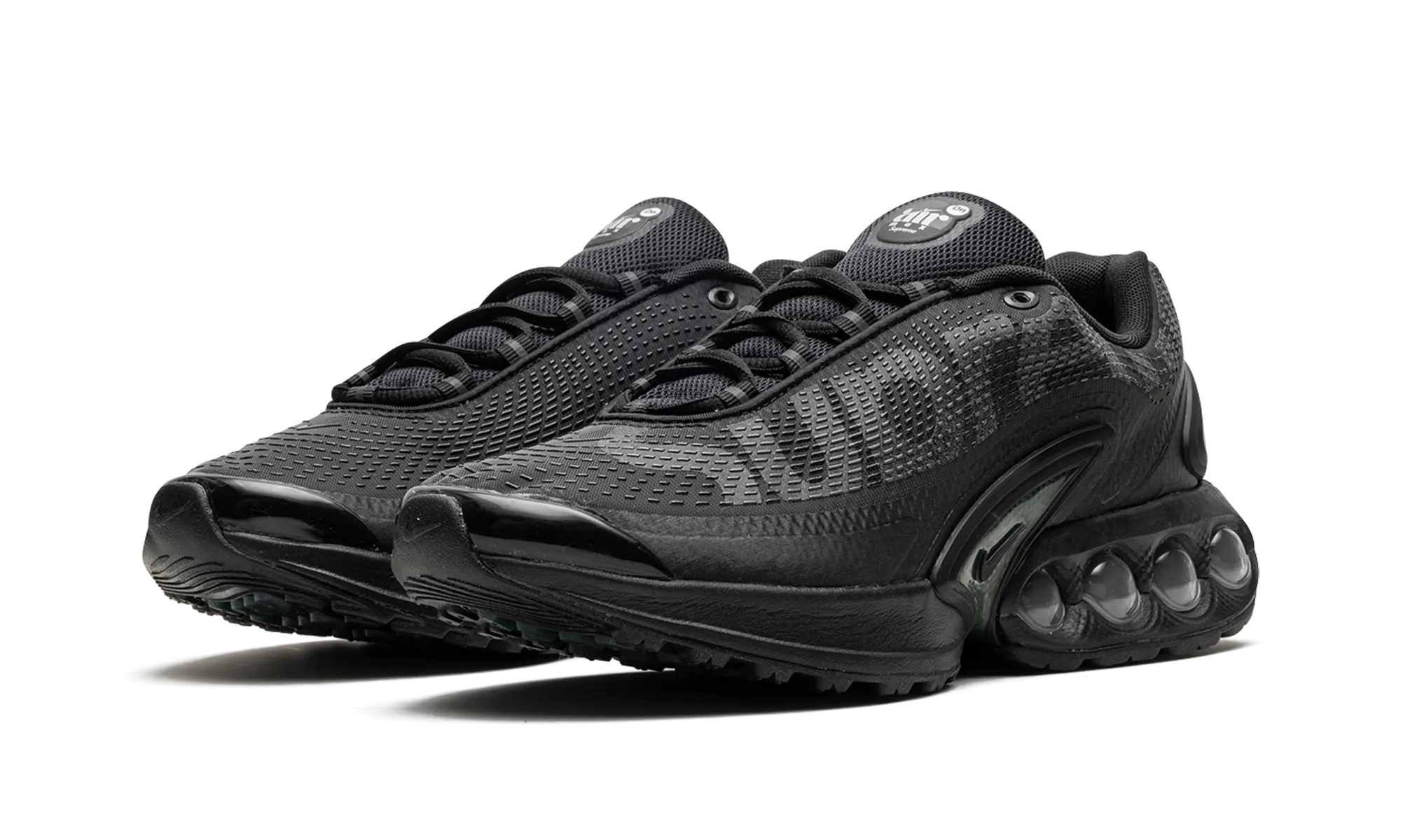 running in a mud pot area shoes Air Max Dn "Supreme - Black"