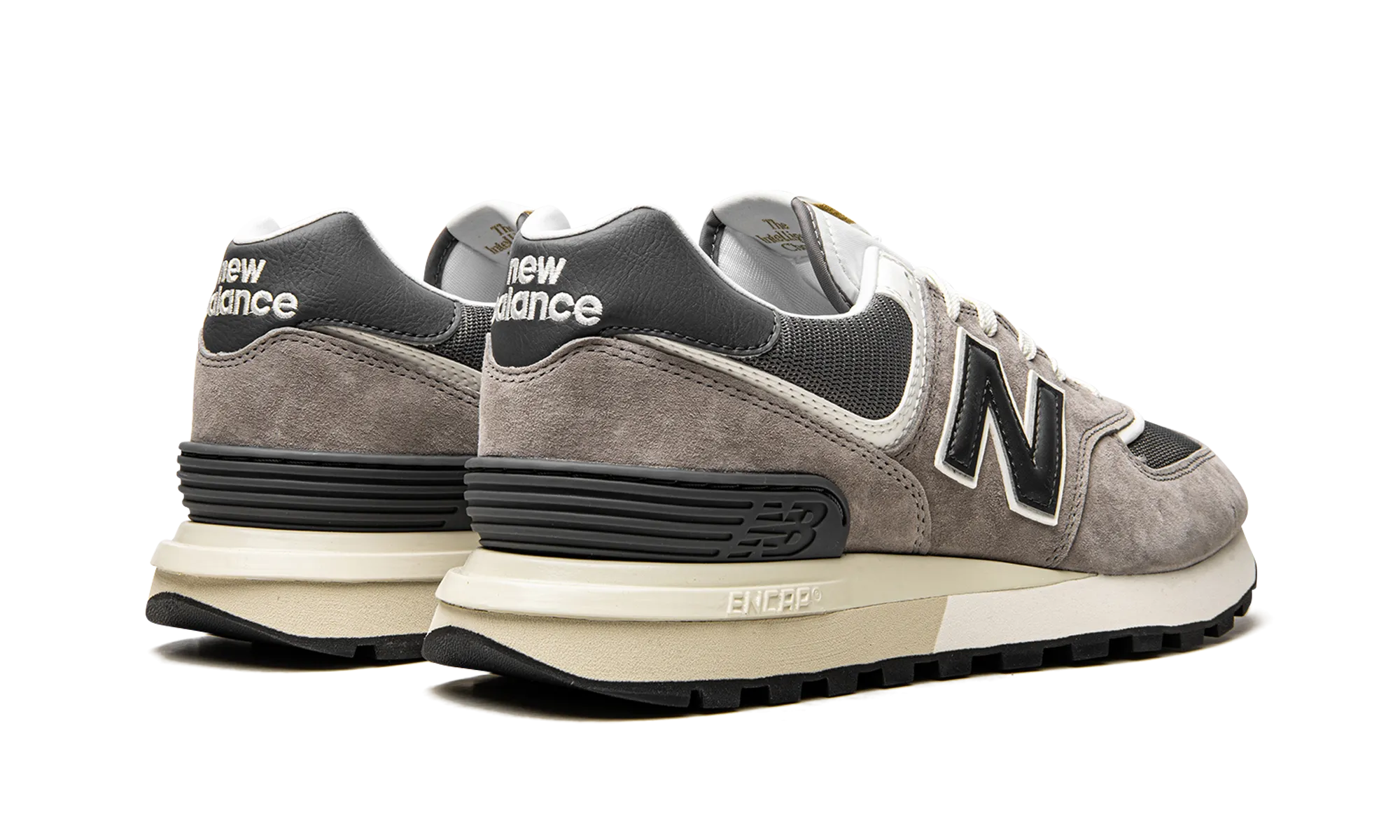 574 "Marblehead/CastleRock" professional running shoes running on a dirt path