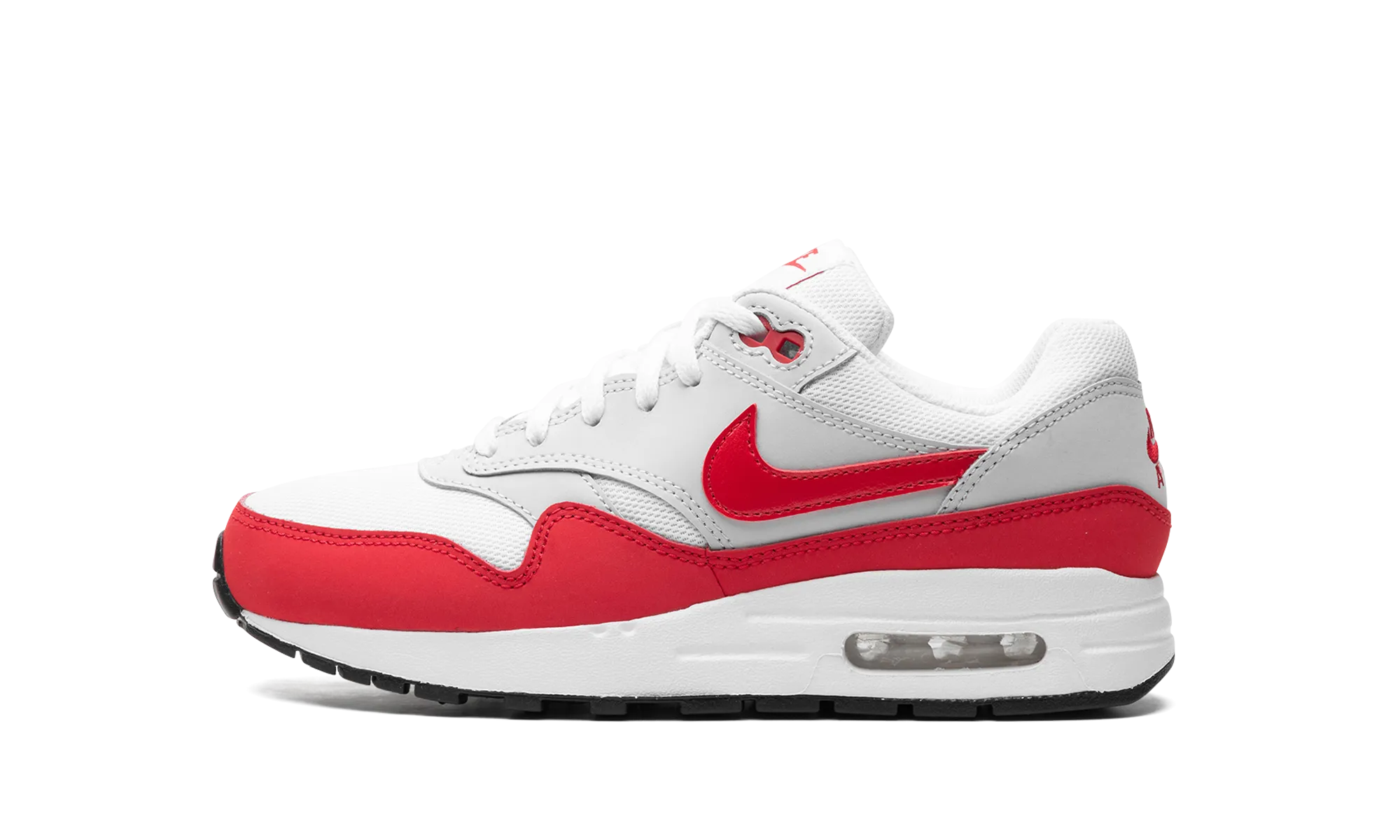 Air Max 1 GS "Sport Red" running in a neighborhood