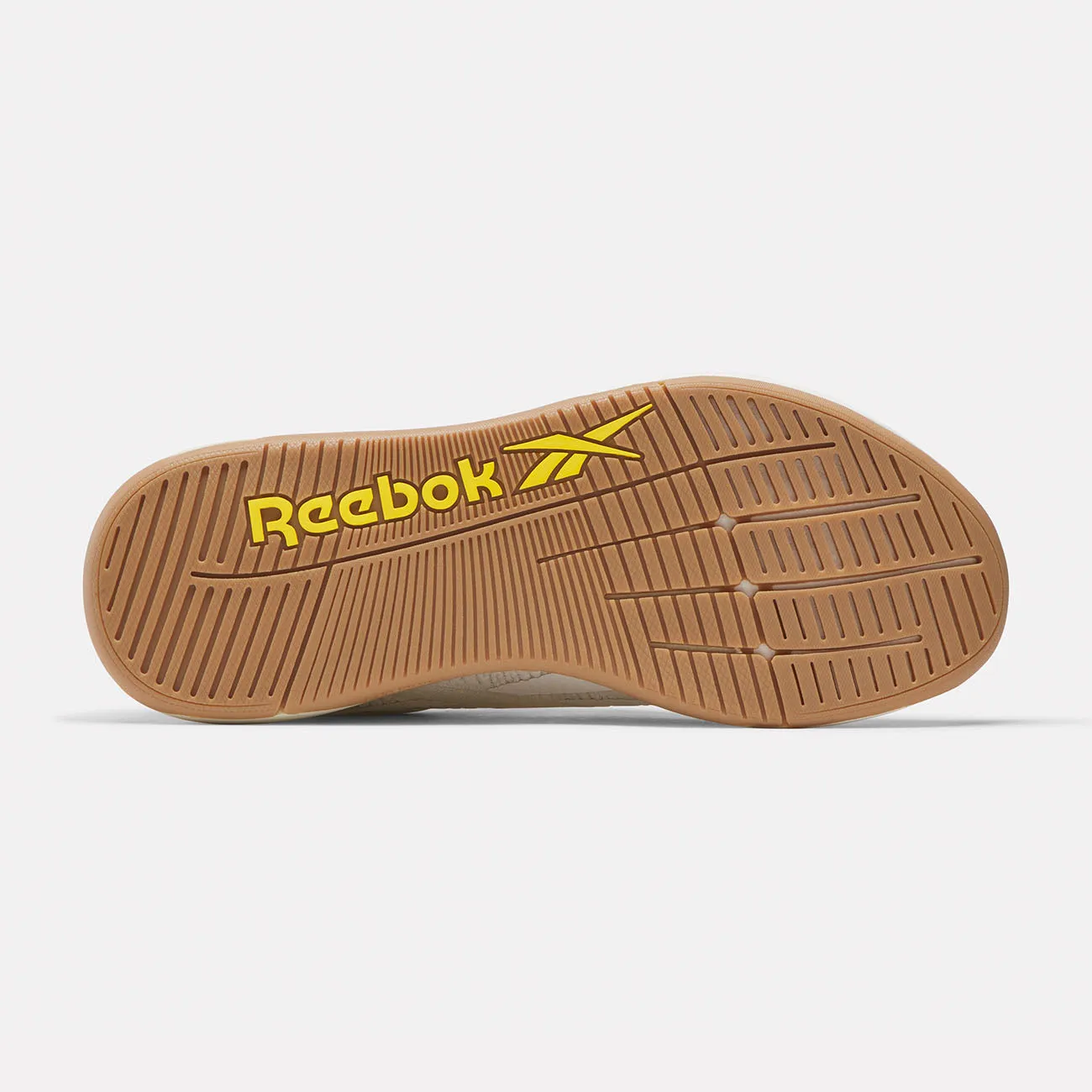 Women's Reebok Nano X5 running in a golf course area shoes running in bright colors