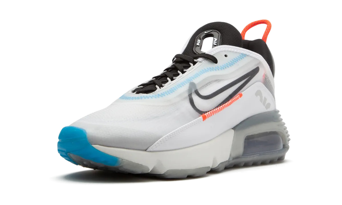 Air Max 2090 "Pure Platinum" running in well - maintained tracks shoes
