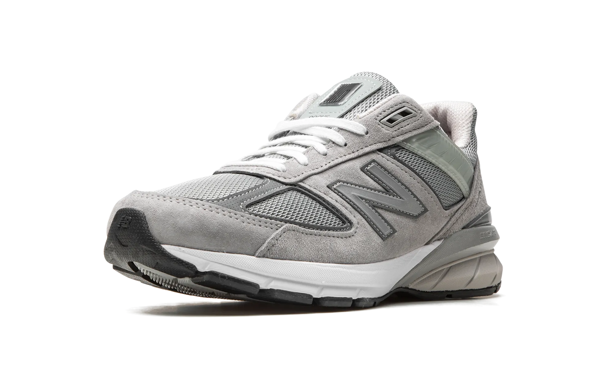 990 V5 "Grey" running in a rural area shoes