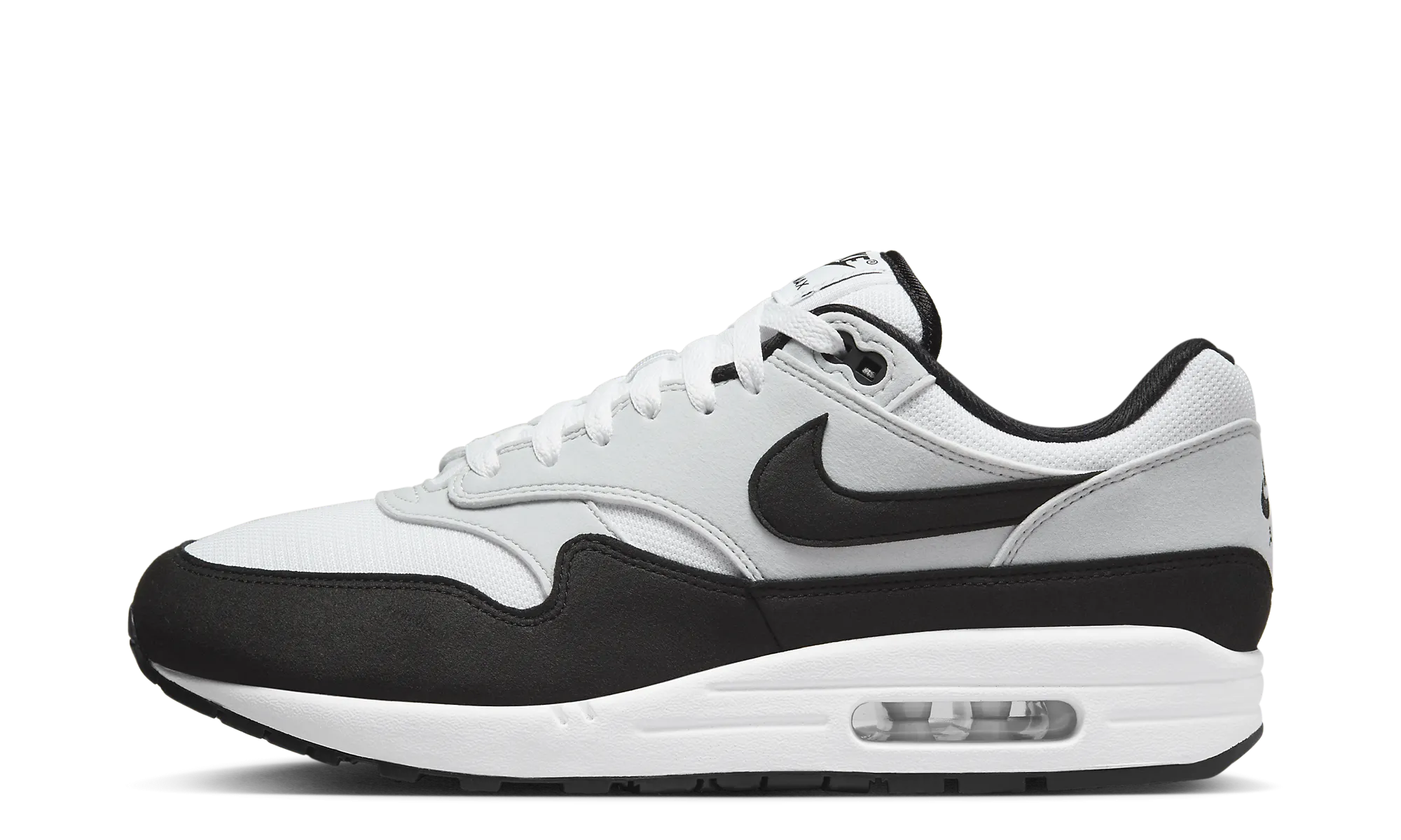 Nike Air Max 1 "White Black" running in a tennis court area shoes
