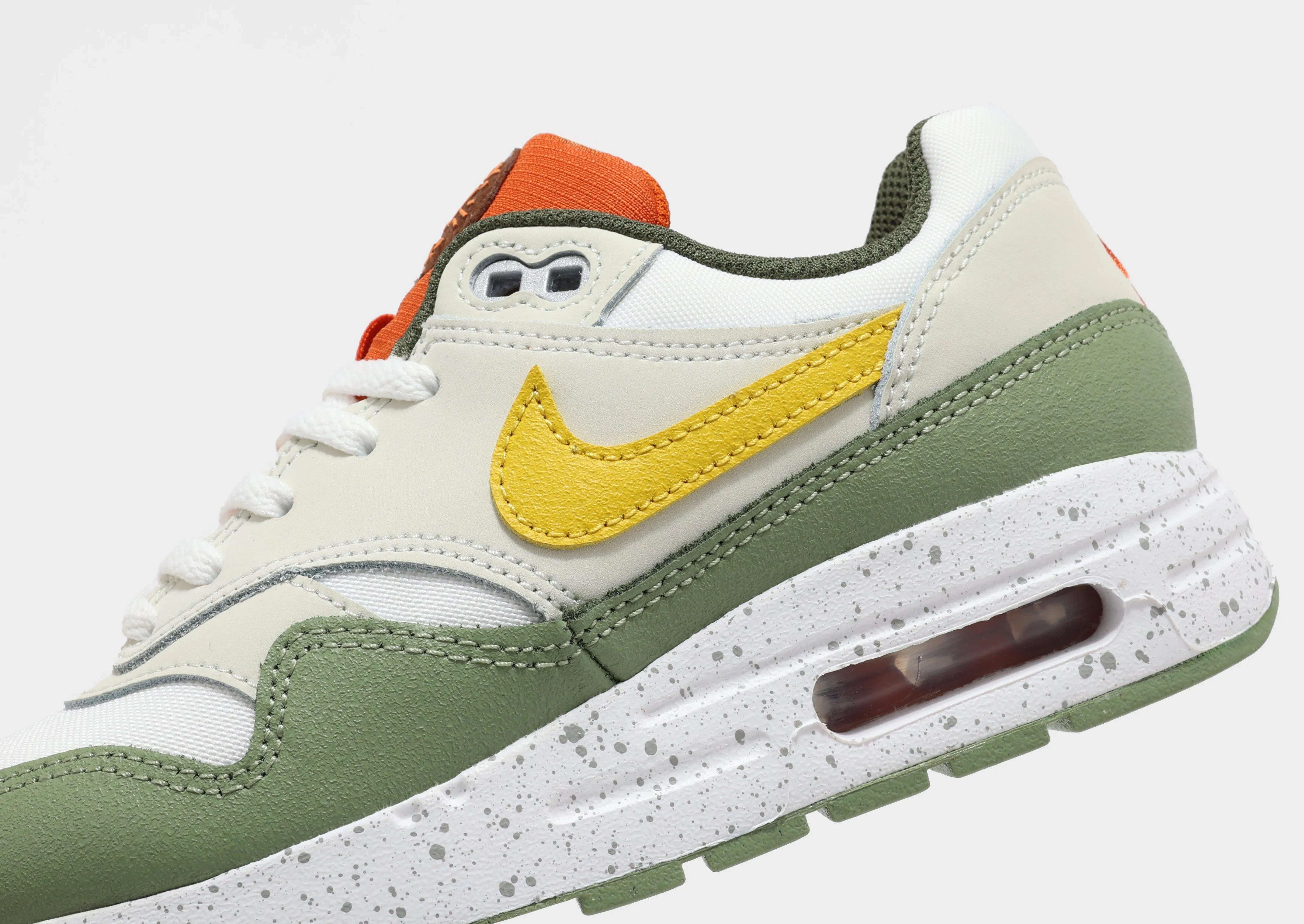 running on an outdoor track shoes Air Max 1 Junior's
