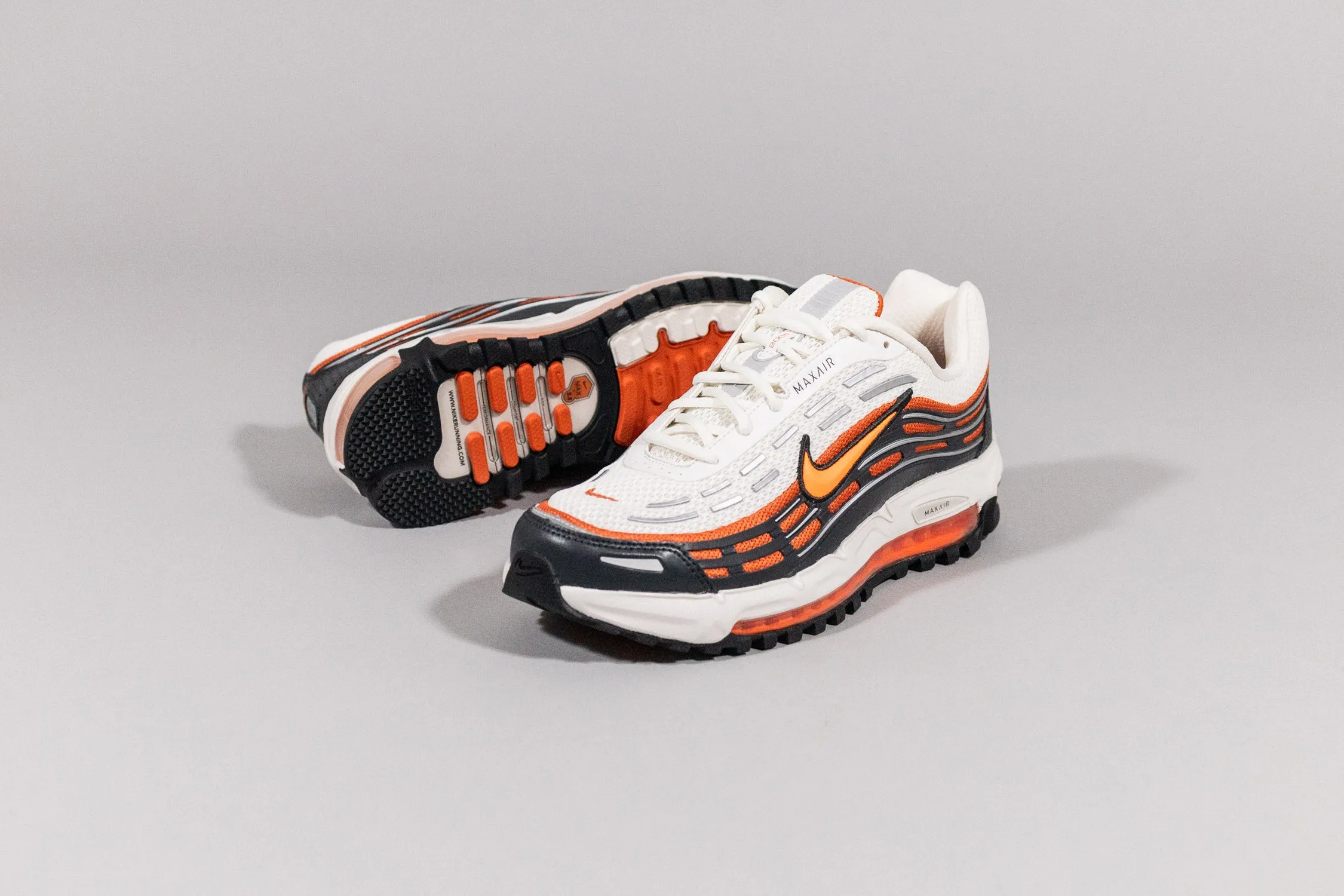 Nike Air Max TL 2.5 'Total Orange' running in a fen area shoes
