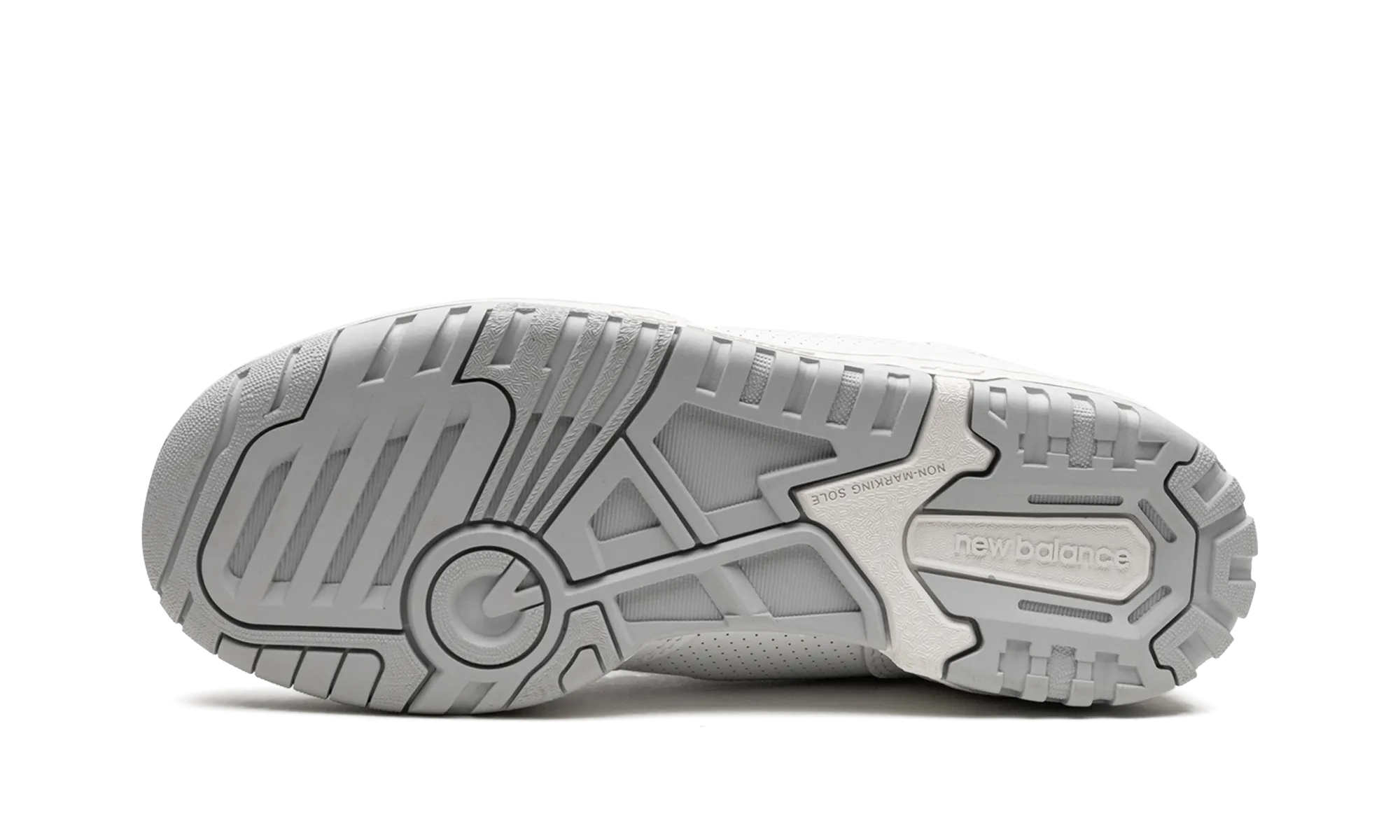 650 "Triple White" running in a channel area shoes