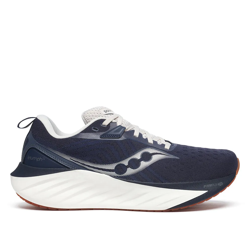 Saucony Men's Triumph 22 Running Shoes running on a dirt path Distinctive