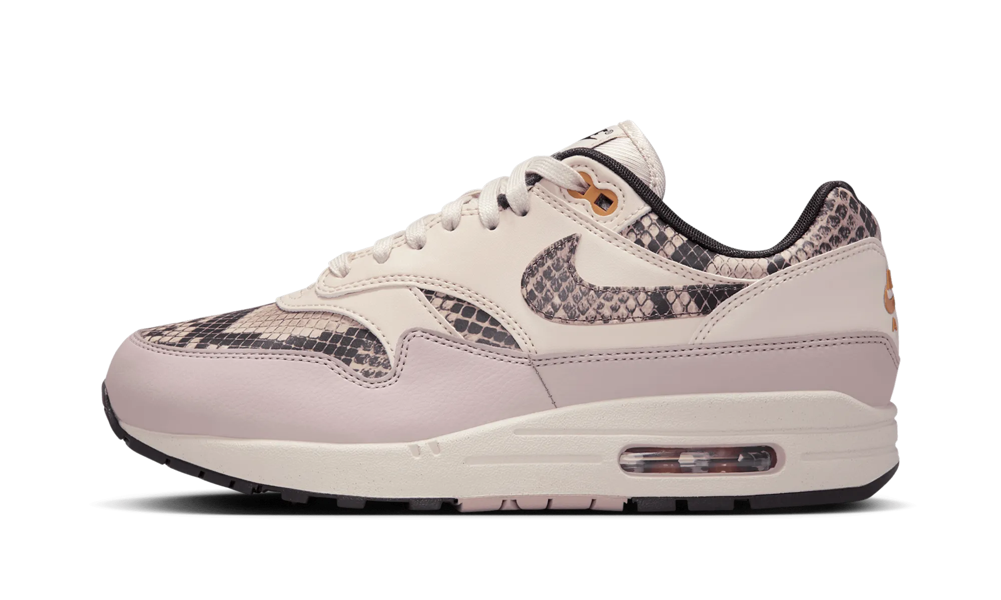 Air Max 1 WMNS "Snakeskin Light Orewood Brown" running in a swimming pool area shoes