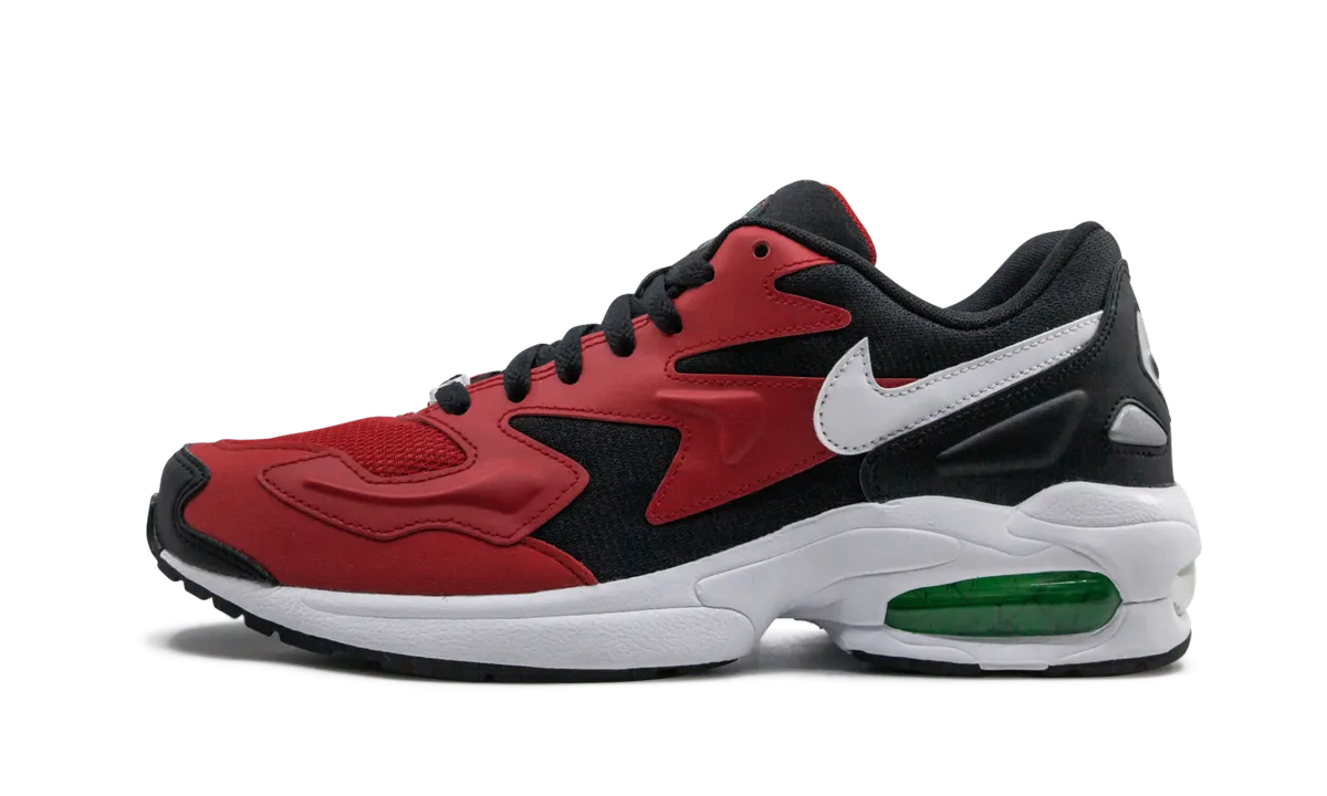 running in a soccer field area shoes cushioned foam shoes Air Max 2 Light