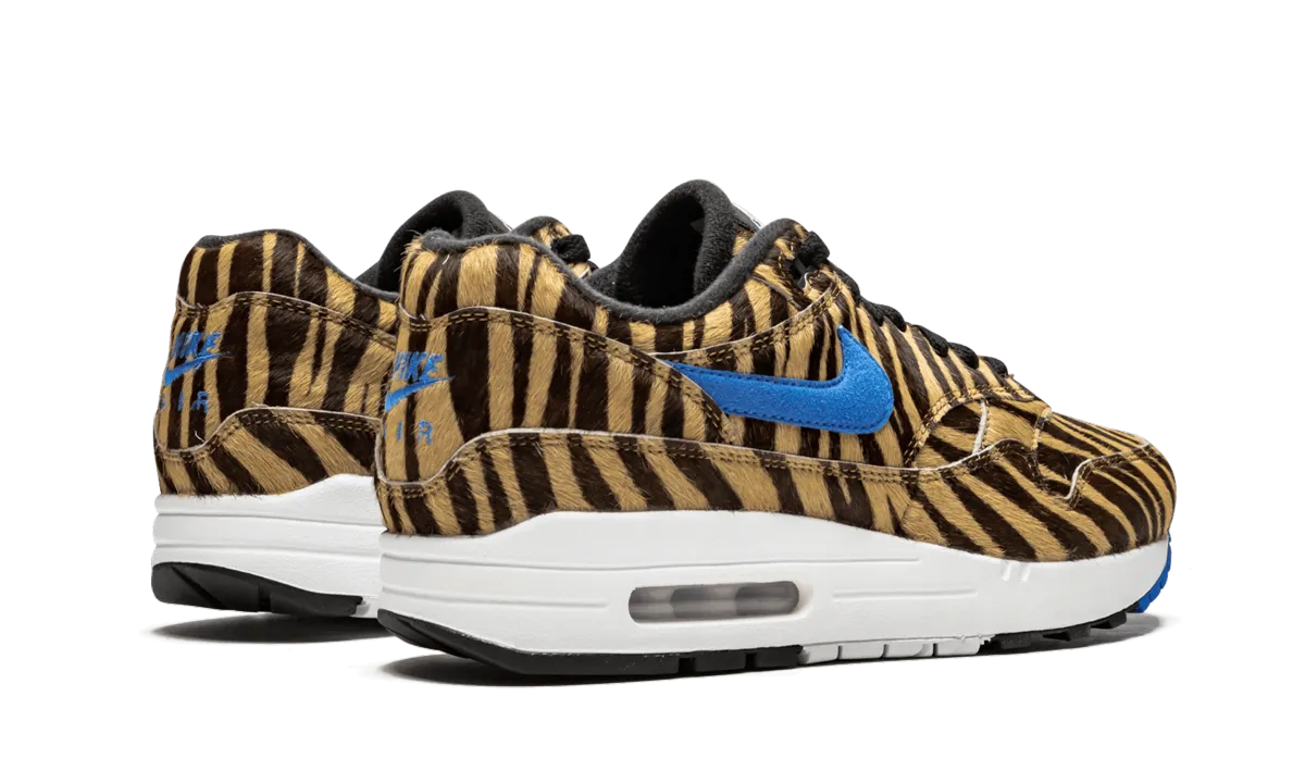 Air Max 1 "Animal Pack 3.0 - Tiger" running on an outdoor track shoes discounted shoes