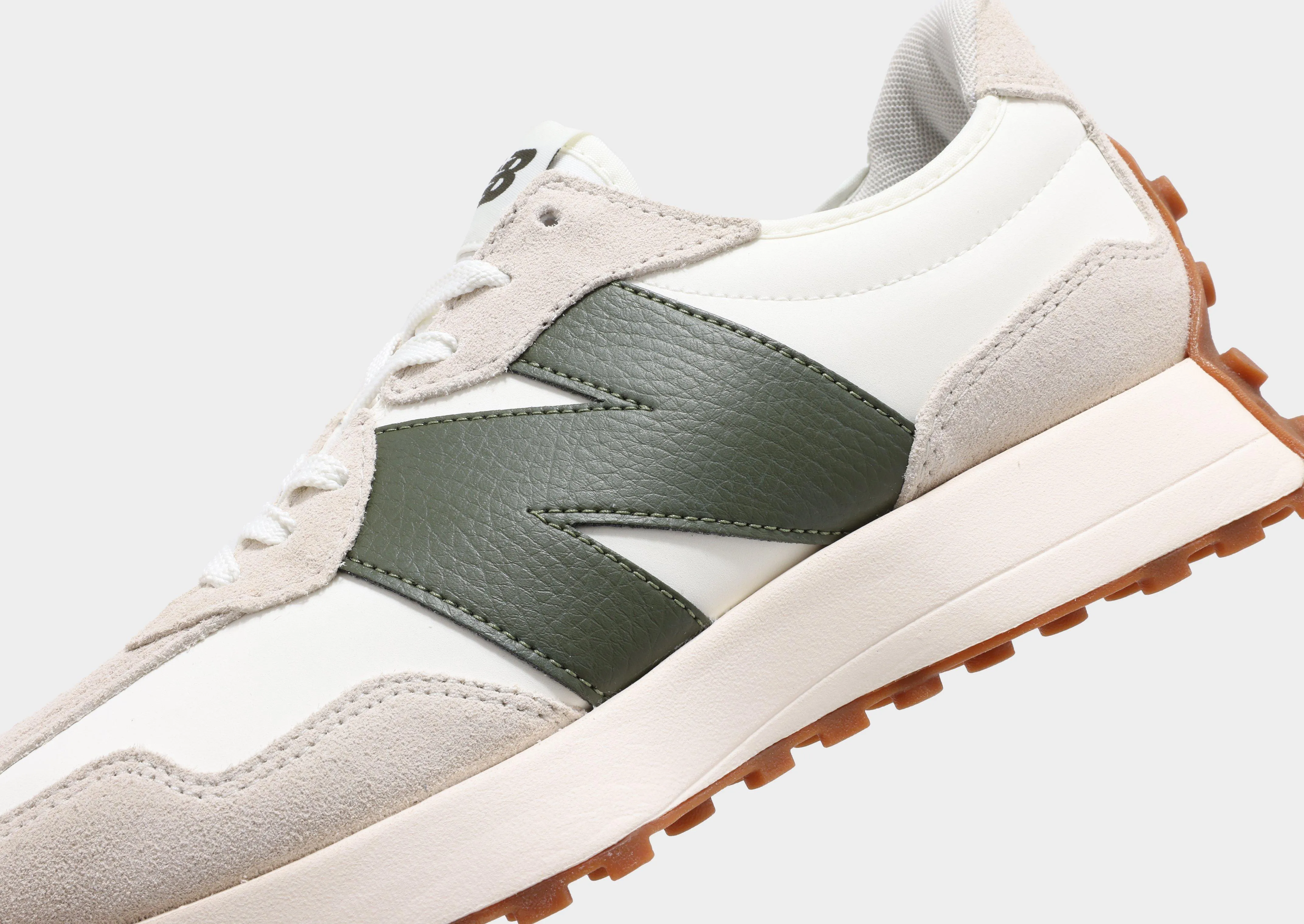 327 muted - colored running shoes
