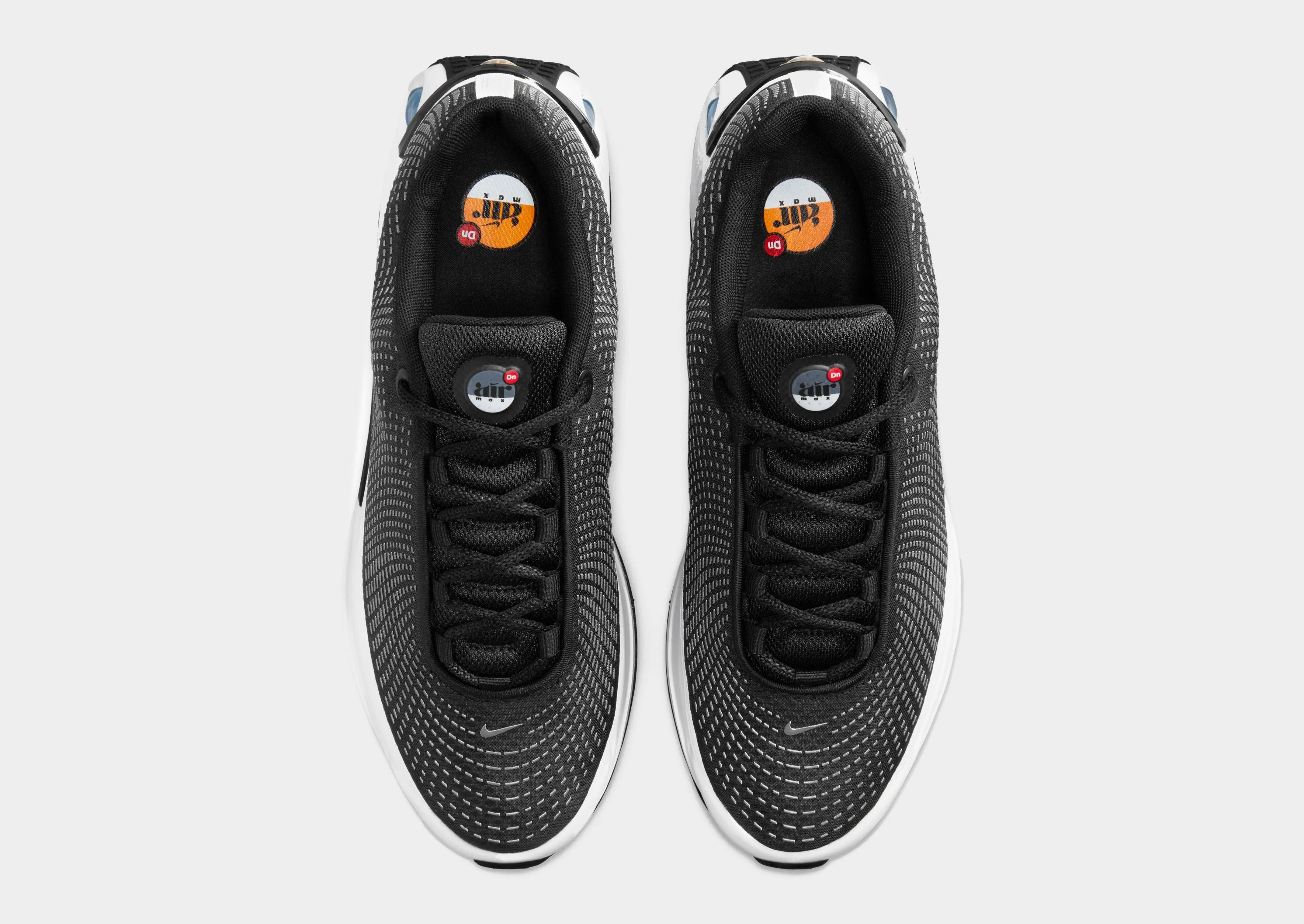 corporate - run running shoes running in a baseball field area shoes Air Max DN Women's
