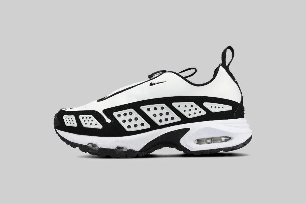 Women's Nike Air Max SNDR 'White and Black' running on inclined ground